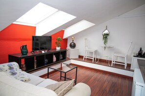 Superior Apartment | Living area | 40-inch flat-screen TV with digital channels - HOSTING DREAMS ATTICS DUOMO (Milan)