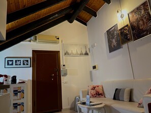 City Apartment | Living area | 40-inch flat-screen TV with digital channels - HOSTING DREAMS ATTICS DUOMO (Milan)
