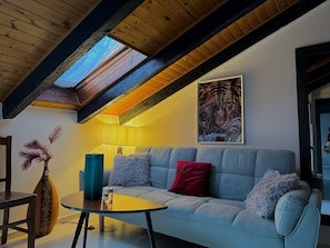 Basic Apartment | Living area | 40-inch flat-screen TV with digital channels - HOSTING DREAMS ATTICS DUOMO (Milan)