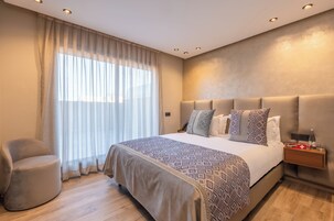 Premium bedding, minibar, in-room safe, laptop workspace