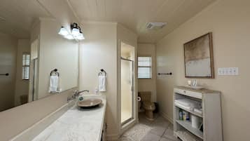 Shower, hair dryer, towels, soap