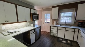 Fridge, microwave, oven, stovetop - Deluxe! New Cozy Apt Near Downtown, Ready for Families and Business Travelers.
(Raleigh)