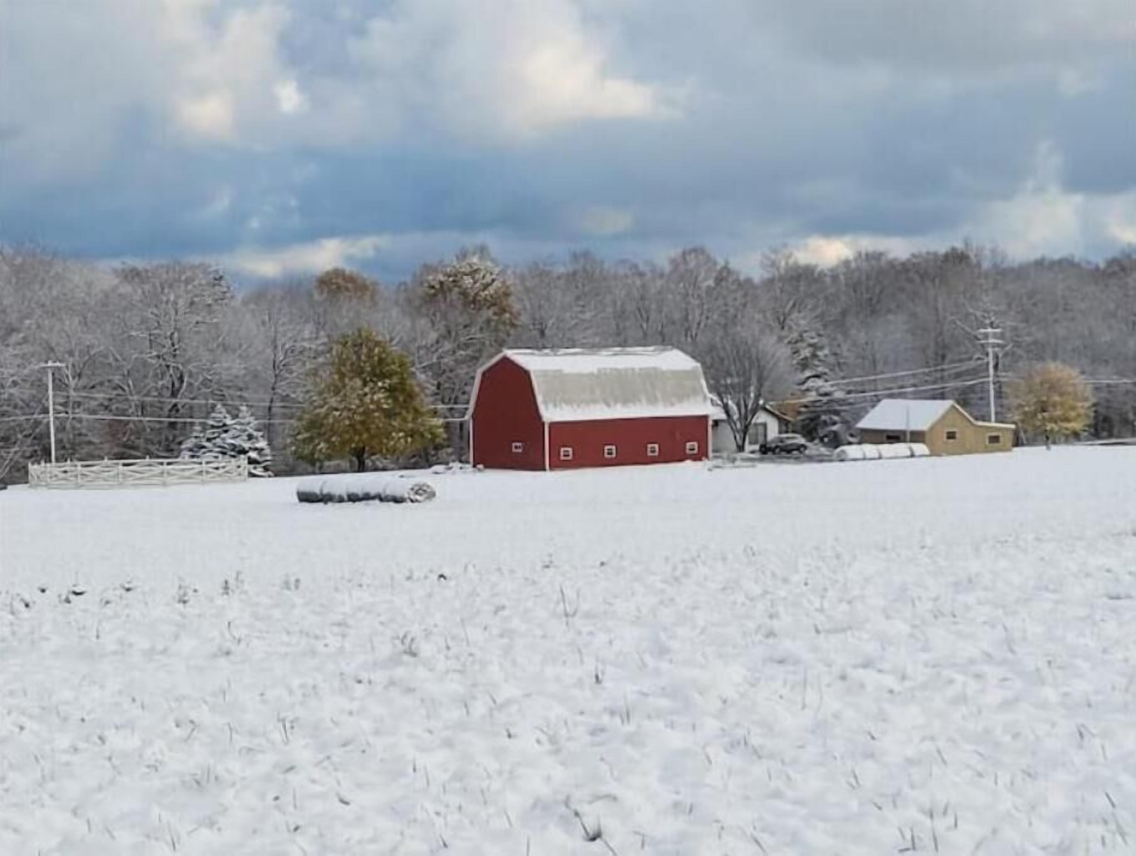 Early snow frosts the landscape.