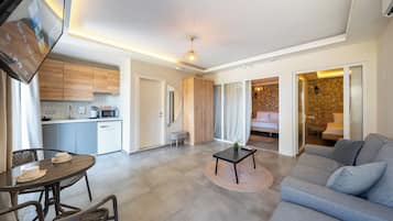 Basic Apartment, 2 Double Beds, Kitchen, Garden View | Living area | 42-inch Smart TV with digital channels
