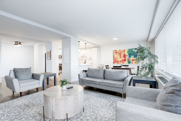 City Apartment | Living area | 55-inch Smart TV with digital channels