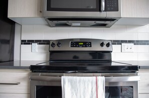 Fridge, microwave, oven, stovetop - Capitol Hill Hideaway: Modern Studio with Free Parking! (Seattle)