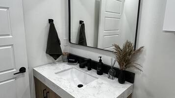 Hair dryer, towels, soap, shampoo