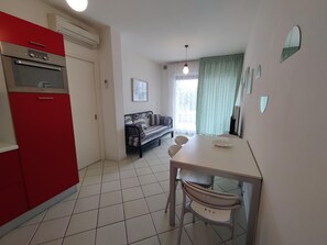 Dining - Apartment 'Residence Aurora Park' with Shared Pool, Private Terrace and Air Conditioning (Jesolo)