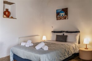 1 habitación, tabla de planchar con plancha, wifi gratis y ropa de cama 