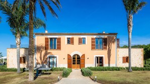 A two-story building with a central entrance, large windows, and a stone facade. - Country House 'Conies Salvia' with Private Pool, Wi-Fi and Air Conditioning (MANACOR)
