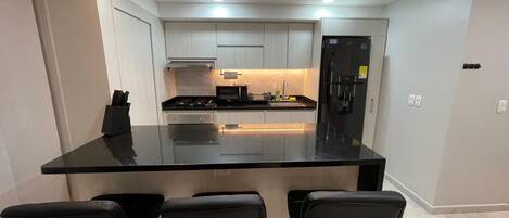 Fridge, microwave, oven, stovetop
