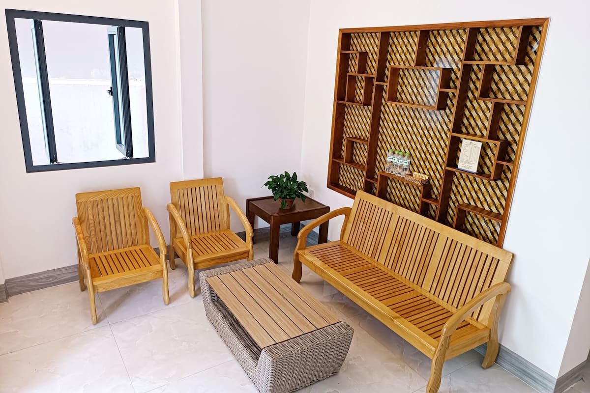 Apartment, 2 Bedrooms | Living area | 32-inch flat-screen TV with cable channels