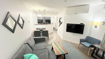 Living room views of dining and kitchen
