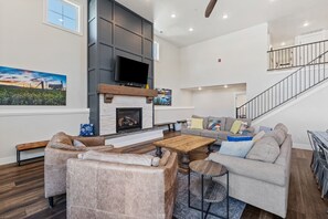 Smart TV, fireplace, foosball