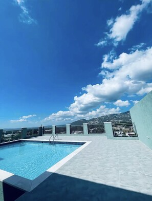 Pool - Luxury one bed room apartment with AC, roof top pool, WIFI located in Kingston. (Kingston)