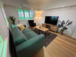 Premium Apartment, 2 Bedrooms, Kitchen, Garden View | Living area | Smart TV