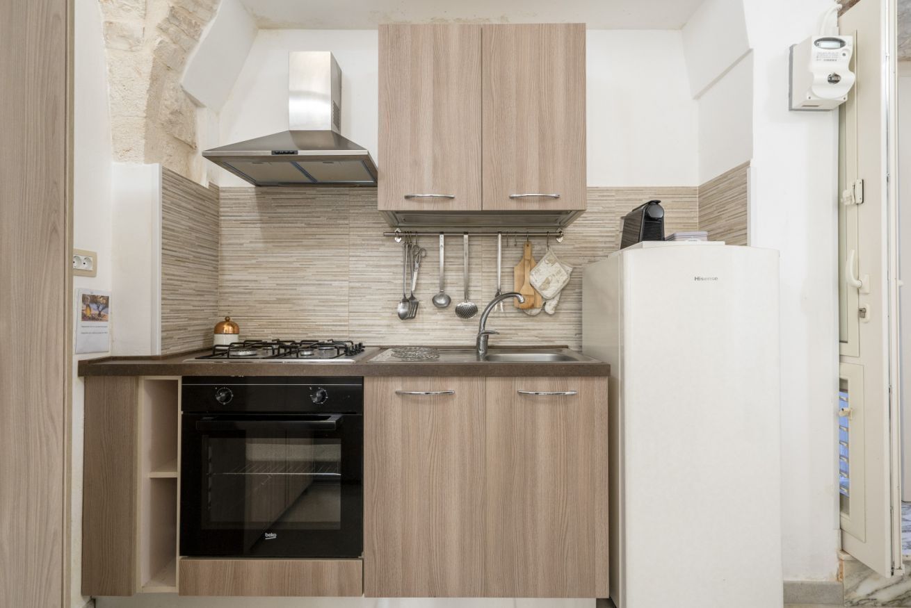 Frigorífico, horno, placa de cocina y cafetera o tetera