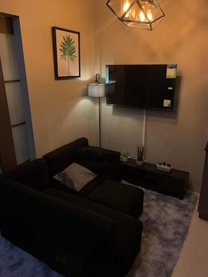 Appart'hôtel Signature, 1 grand lit et 1 canapé-lit, vue ville | Salle de séjour