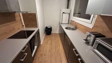 Fridge, microwave, oven, cookware/dishes/utensils