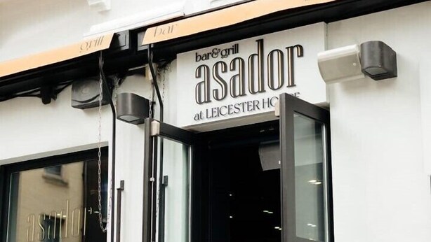 The exterior of a bar and grill named 'Asador' at Leicester House. - Leicester House Hotel (London)