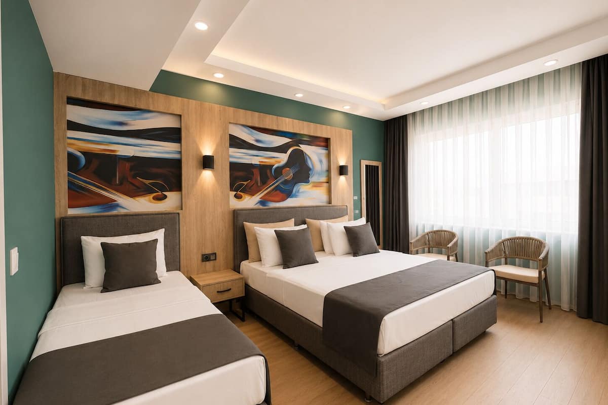 A hotel room with two beds, a large painting on the wall, a window with curtains, and a chair.