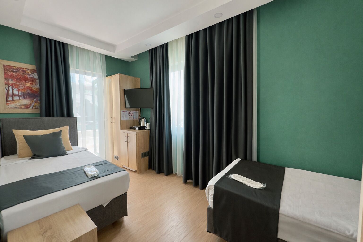 Habitación estándar con 2 camas individuales | Insonorización, tabla de planchar con plancha y wifi gratis 
