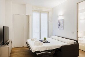 1 habitación, tabla de planchar con plancha, wifi y ropa de cama 