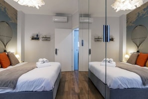 2 habitaciones, tabla de planchar con plancha, wifi y ropa de cama
