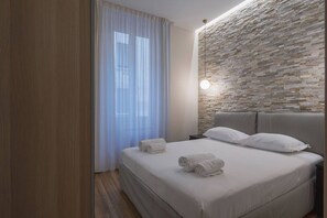 1 chambre, fer et planche à repasser, Wi-Fi, literie fournie