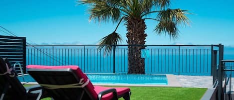 Outdoor pool, pool umbrellas, pool loungers