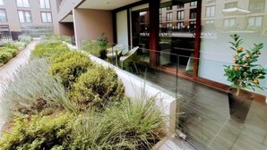 Lejlighed - 1 soveværelse - terrasse - udsigt til have | Udendørsområde