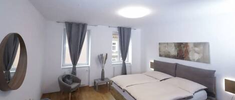 2 slaapkamers, een strijkplank/strijkijzer, gratis wifi, beddengoed