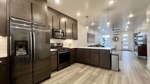 Coffee/tea maker, fridge, microwave, oven