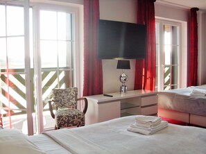 Panoramic Quadruple Room, 1 Bedroom, Balcony | Travel crib, rollaway beds, free WiFi, bed sheets - Hotelik Mazurska Chata (Mikolajki)