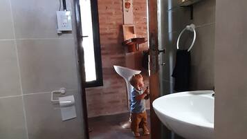 Shower, bidet, towels, soap