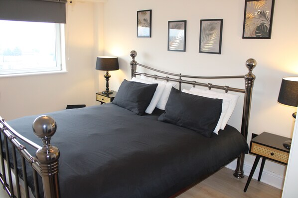 2 dormitorios, tabla de planchar con plancha, wifi y ropa de cama