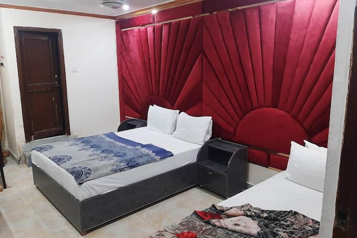 Chambre Double Deluxe | Chambres insonorisées, fer et planche à repasser, Wi-Fi gratuit