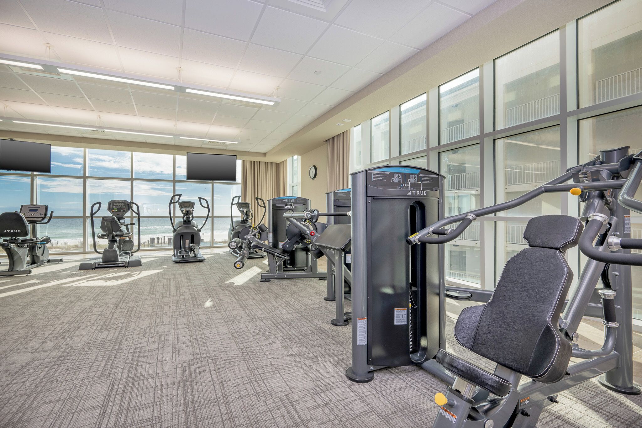 Get in your workout in the fitness centers with stunning beachfront views and modern equipment for your routine