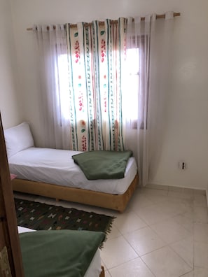 Classic Single Room, 1 Queen Bed | 1 bedroom, in-room safe, bed sheets