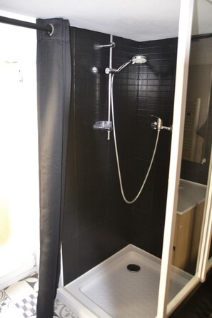 Jetted bath, hair dryer, towels, soap