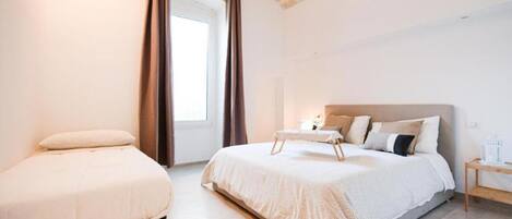 2 chambres, fer et planche à repasser, Wi-Fi, draps fournis