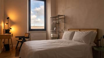 Habitación cuádruple familiar | Sábanas italianas Frette y ropa de cama de alta calidad