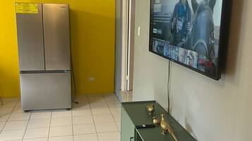 Luxury Cottage | Living area | 55-inch Smart TV with digital channels, Netflix, streaming services