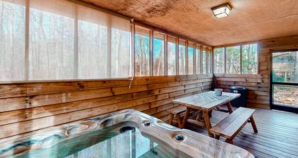 Dog-friendly cabin with private hot tub, wood fireplace, firepit, & washer/dryer