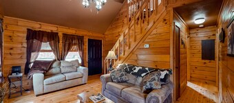 Dog-friendly cabin with private hot tub, wood fireplace, firepit, & washer/dryer
