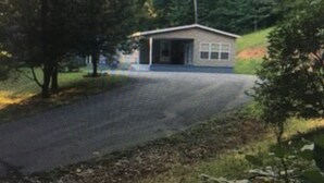 A view through a mesh screen, obscuring details. - Centrally located between Bryson City, Sylva and Cherokee.5 mins to the Casino. (Whittier)