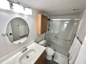 Shower, towels, soap, shampoo