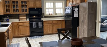 3 bedroom/2 bath home; close to EAA. Large kitchen and outside deck area.