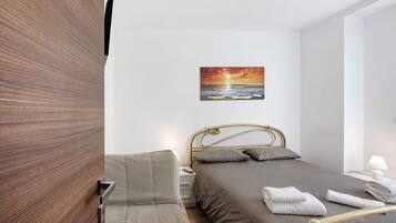 1 chambre, fer et planche Ă  repasser, Wi-Fi gratuit, draps fournis
