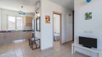 1 chambre, fer et planche Ă repasser, Wi-Fi gratuit, draps fournis